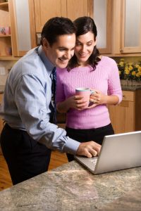 buyers looking at listings on a laptop