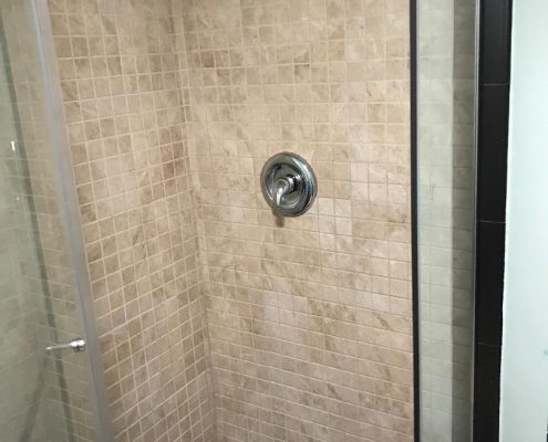 close up shower in basement 67 Ladd
