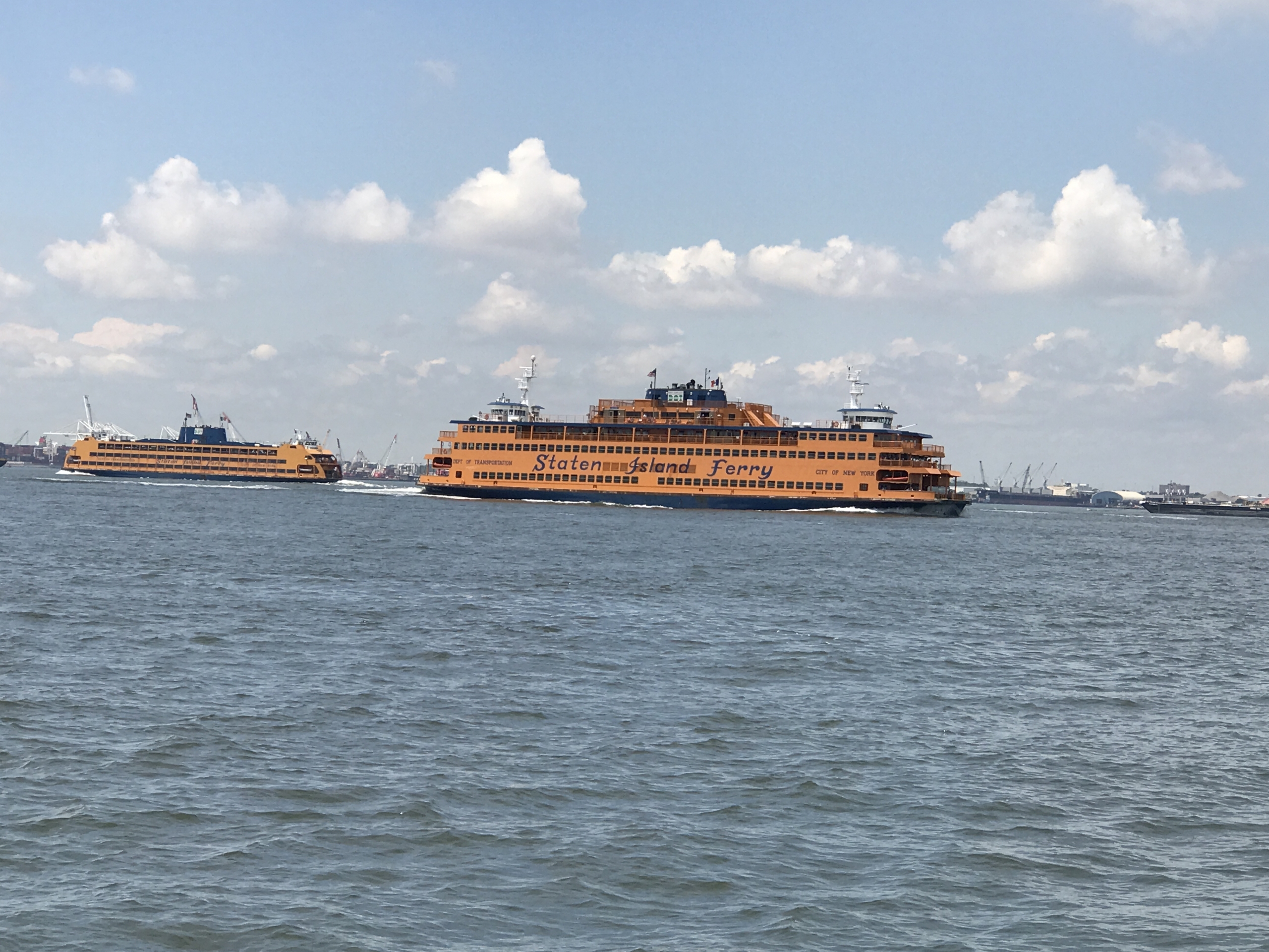 Two Staten Island Ferry boats close up JUne 2017 A.T. REAL Estate