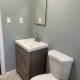 161 Colon Ave bathroom sink and commode view 1